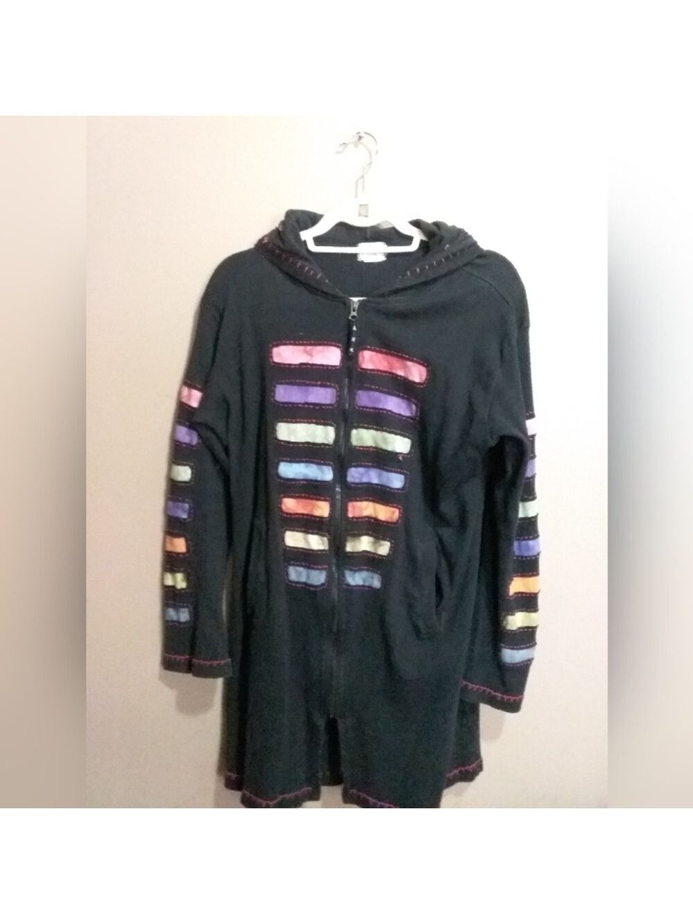 Arc imports Black hooded jacket with rainbow stripes and tassels